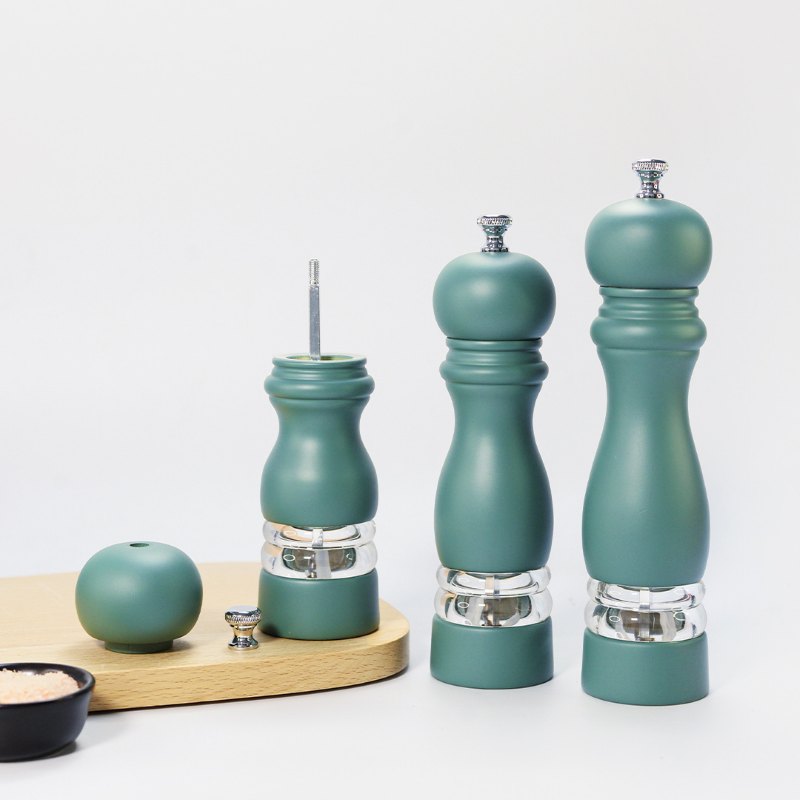 Three-piece wooden salt and pepper mill set with ceramic grinding cores in graduated sizes