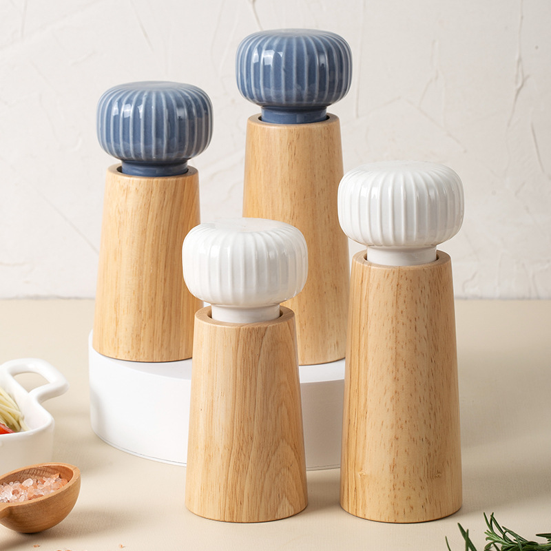 Three-piece wooden salt and pepper mill set with ceramic grinding cores in graduated sizes